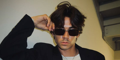 Content creator Zack Lugo was seen wearing gold Gucci GG1495S 001 rectangular sunglasses in his Instagram post, August 2024. Shop online now on Pretavoir