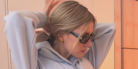 YouTube executive and internet personality Zita D'Hauteville was seen wearing black Miu Miu MU B09S 16K08Z Reverie sunglasses in her Instagram post, May 2026