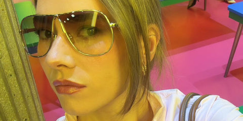 Internet personality and YouTube Partner Manager Zita d'Hauteville was seen wearing gold Miu Miu MU A56S 5AK90L sunglasses with brown gradient lenses at the Miu Miu Spring/Summer 2026 fashion show during Paris Fashion Week.