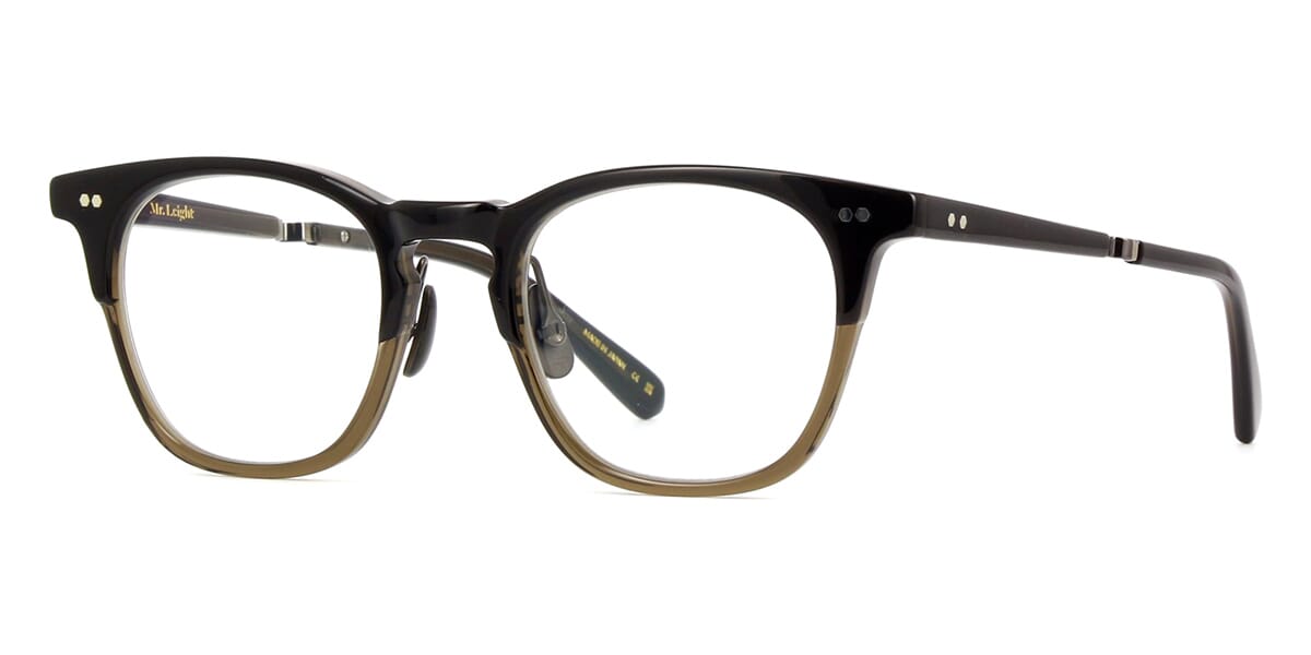 Side view of black and transparent brown eyeglasses frame