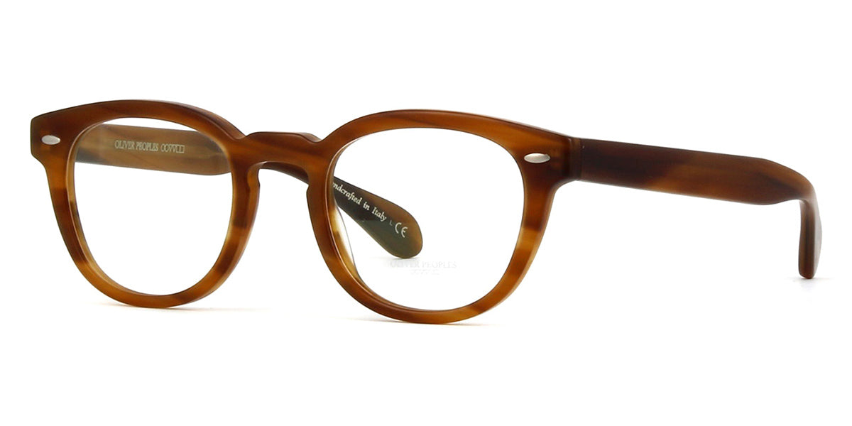 Three quarter view of thick amber colour eyeglasses